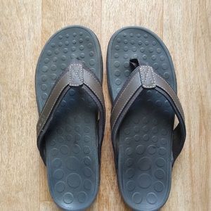 Brown male flip flop.